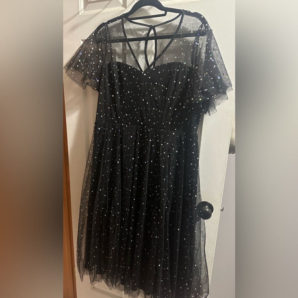 Torrid Dress Size 16 NWT sheer fabric, sparkly stars.  Perfect for Halloween.